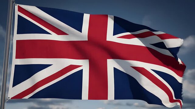 Waving Union Jack flag against a cloudy blue sky