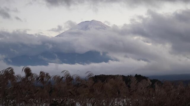 Mount Fuji Emerging Through Dramatic Clouds in Japan