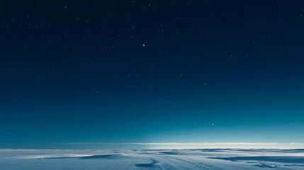 Fototapeta premium A serene and vast winter landscape under a starry night sky