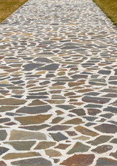 A walkway constructed using a technique known as irregular stone paving