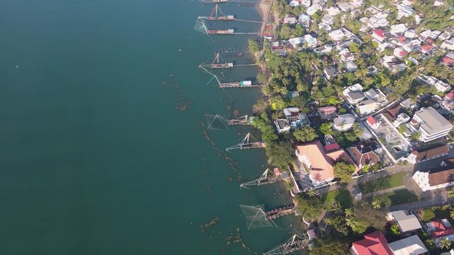 aerial view of fishing net with boats , kochi