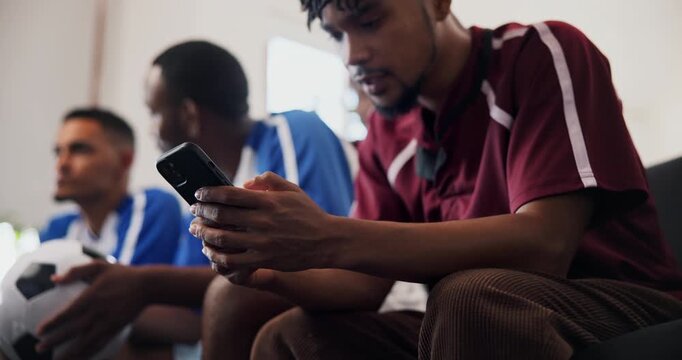 Friends, watching tv and man with phone in home for research, soccer player stats and sports betting. Below, typing and people with football match broadcast, mobile and line up news on social media