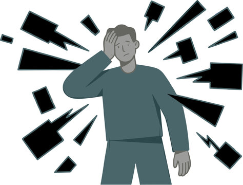 A man with frustration on his face standing amidst exploding shapes.