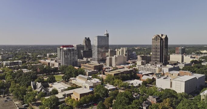 Raleigh North Carolina Aerial v82 flyover Moore Square Park capturing downtown cityscape under bright sunlight - Shot with Mavic 3 Pro Cine - Oct 1st 2023