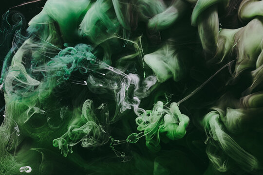 Abstract green background. Moving smoke flow, fluid liquid art.
