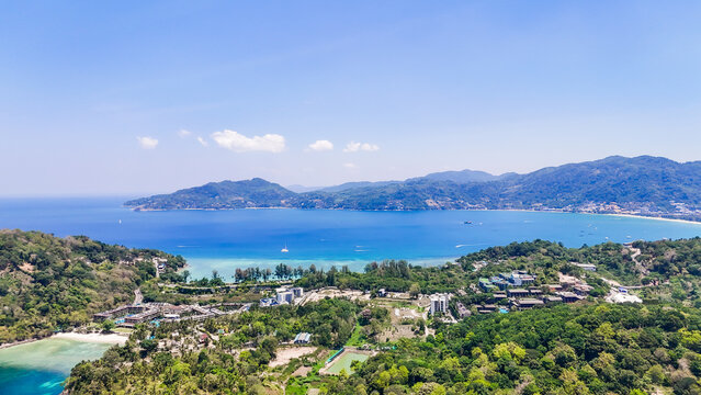 An aerial photograph of the area near Patong, Phuket Island, Thailand, taken from Freedom Beach, Phuket, Thailand at 10 am. The start of the summer sunbathing season.