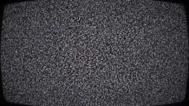 A grainy, textured image in shades of gray. The composition has a rounded rectangular frame. The texture appears to be uniformly dispersed