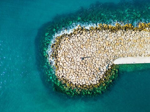 Aerial view of Moraira breakwater in Mediterranean Sea
