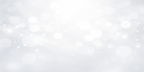 Obraz premium Abstract Christmas bokeh background with blue and silver holiday lights