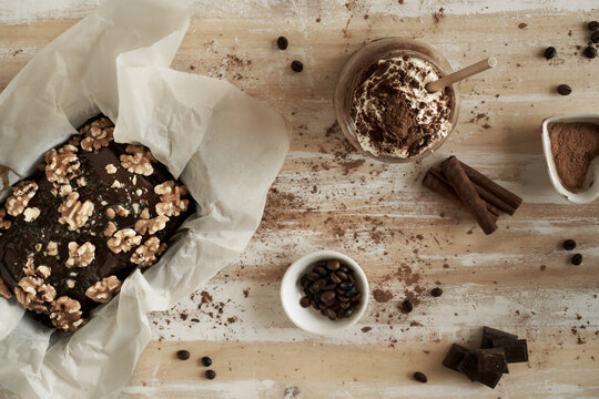 Rustic chocolate brownie with walnuts and coffee