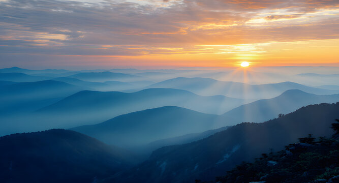 Misty Blue Mountain Layers at Golden Sunset with Glowing Trees
