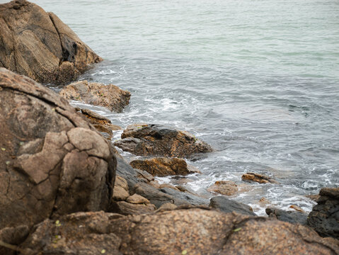 Coastal rocks by the water at Ipanema Beach