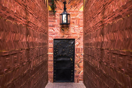 Detailed clay wall and doorway in Marrakech, Morocco