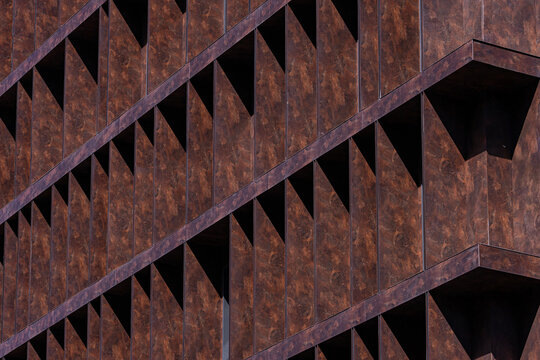 Abstract modern facade detail with geometric metal fins