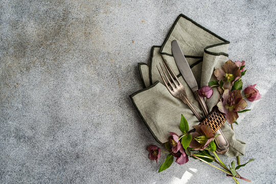 Rustic spring table setting with hellebore flower decor
