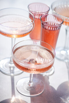 Elegant pink beverages in crystal glassware