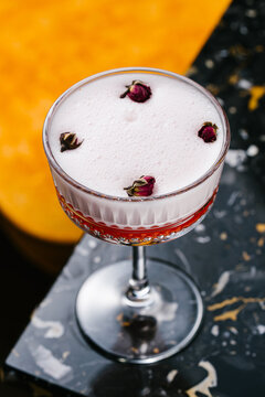 Pisco Amour Rose Sour cocktail with egg white foam
