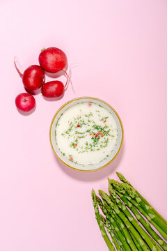 Okroshka cold soup with kefir, radish and asparagus