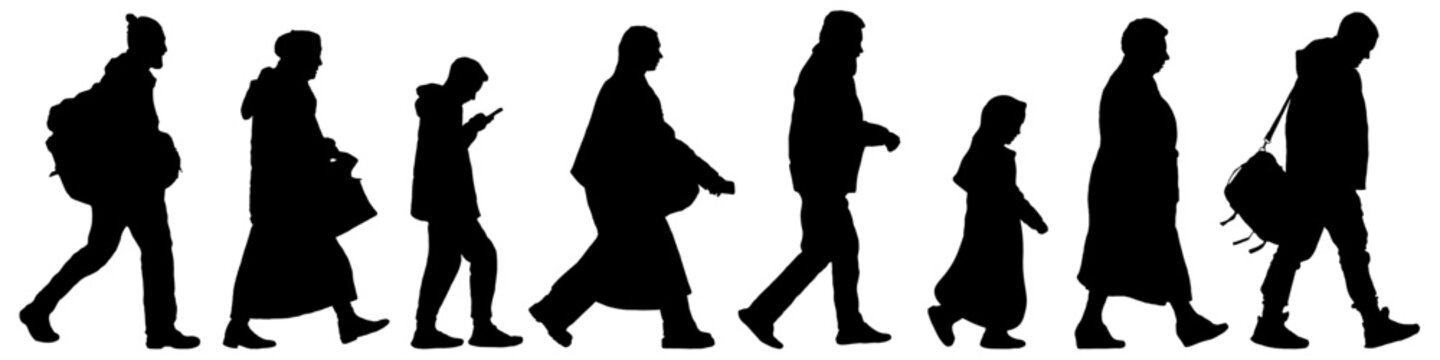 Silhouettes of diverse people walking, moving forward. Side view. Human migration