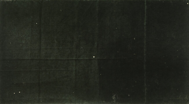 Folded Dark Paper Texture with Creases and Imperfections Background