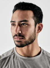 Fototapeta premium Serious, thinking and athlete with fitness in studio for reflection, exercise pride and healthy body. Personal trainer, bodybuilder and membership for training, sportswear and man on white background