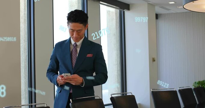 Adjusting tie, man grasping phone by windows, scrolling while overlays drifting for data review