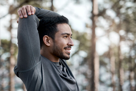 Stretching, athlete and fitness with man in nature for health, sports challenge and workout. Muscle warm up, exercise balance and wellness with person outdoor for training, performance and commitment