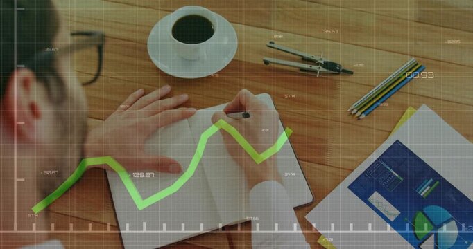 Male analyst writing in notebook pen touching paper activating green finance graph showing trends