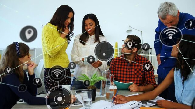 Presenter tapping tablet and initiating design review, network icons multiplying across table