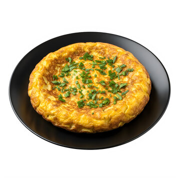A round frittata on a black plate with green herbs isolated on transparent background