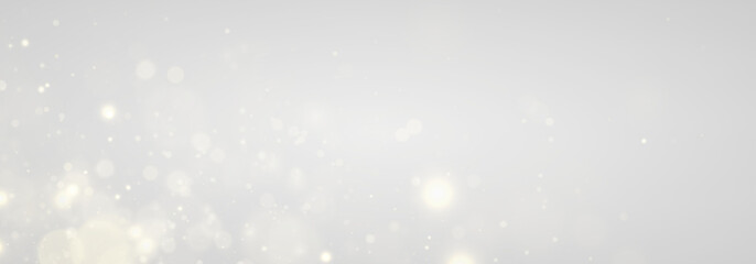 Naklejka premium Golden dust sparkles with glitter, sparks, shimmer light, glowing bokeh blur. Twinkling particles, radiant highlights, luminous flare create festive Christmas and New Year magic. PNG illustration.