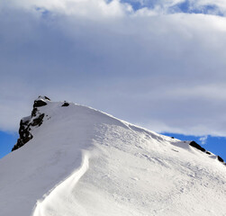 Top of mountains with snow cornice after snowfall © BSANI