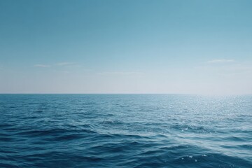 Fototapeta premium Vast Blue Ocean and Clear Sky Horizon on a Sunny Day Sea Journey