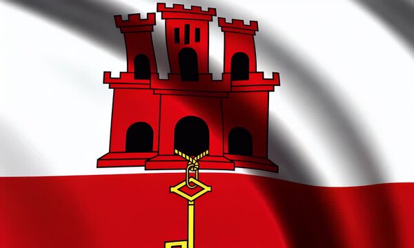 The flag of Gibraltar waves gently with its iconic red castle and golden key symbol prominently displayed on a white and red background.