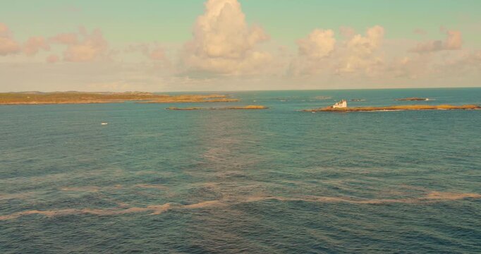 Skagerrak Sea landscape view distant islands with coastal Gronningen Lighthouse, Kristiansand, Agder, Norway