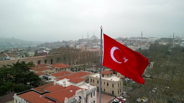 Turkish flag near the Fatih Memorial Park in Istanbul parallel movement shot