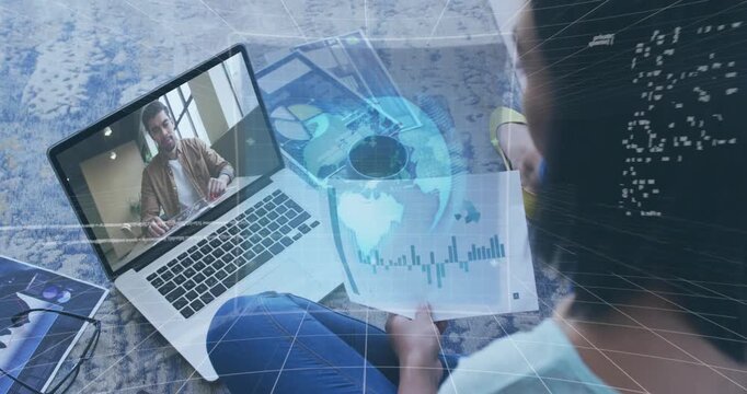 Animation of data processing over rear view of woman holding a document having a videocall on laptop