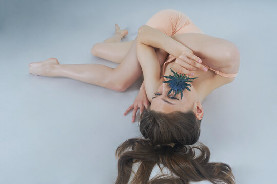 visualization of a woman's self-perception, psychological state, negative emotions, female with a thistle flower