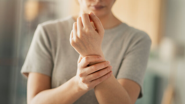 Young woman with wrist pain