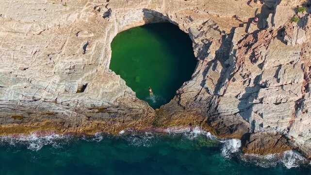 Woman Swimming in Giola Natural Sea Lagoon, Thasos