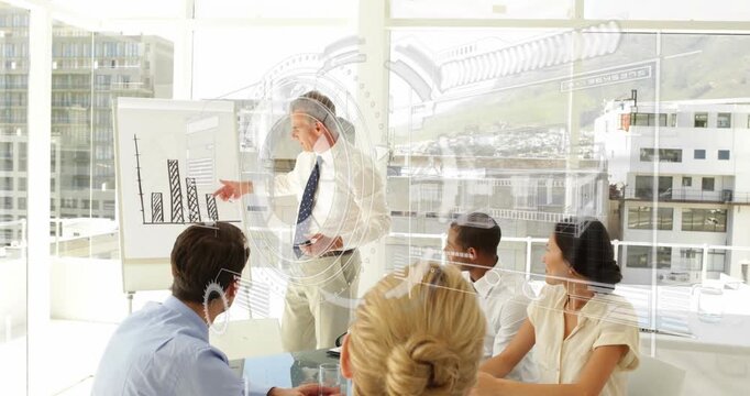 Animation of data processing over caucasian businessman giving a presentation at office