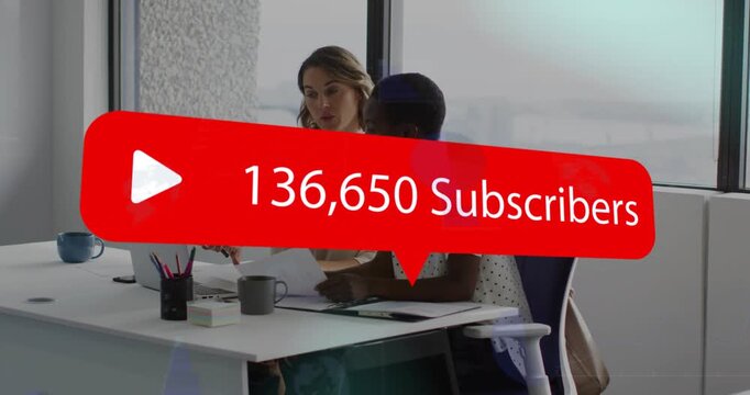 2 women reviewing, talk sparking red subs graphic growing, obscuring faces, tracking social growth