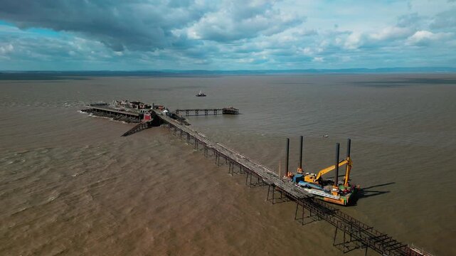 The reconstruction of the old Birnbeck pier in England, platforms and cranes