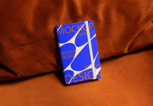 Bright front cover Book Mockup on a Couch Surface