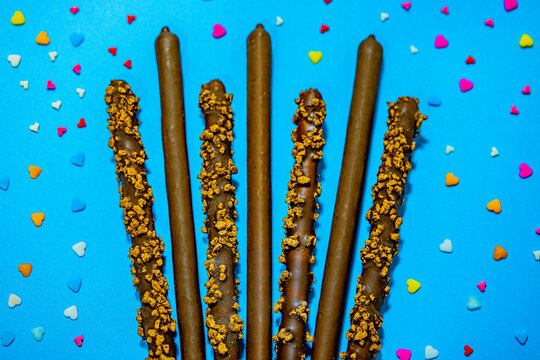 Dropped in chocolate a stick cookie Pepero. November 11th is Pepero Day in Korea