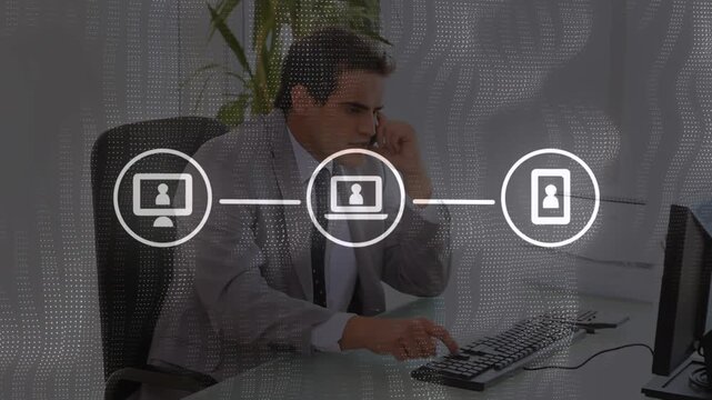 Animation of wireless icons in flow chart over caucasian businessman talking over phone in office