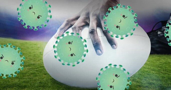 Animation of falling covid 19 cells over american football ball