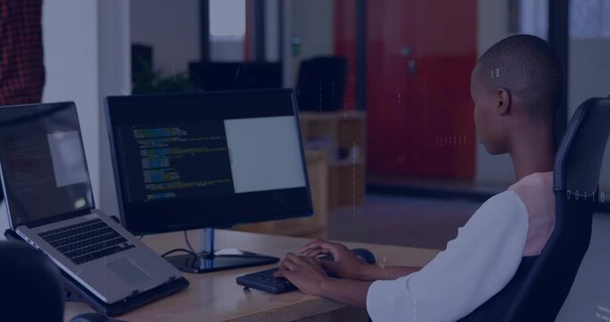 Software developer typing code for debugging causing code overlays growing around desk