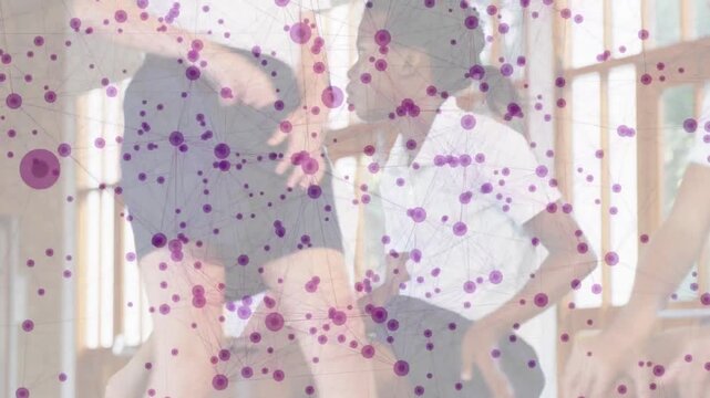 Three children sitting on bench in school hall, right child rising, squatting, returning to seat