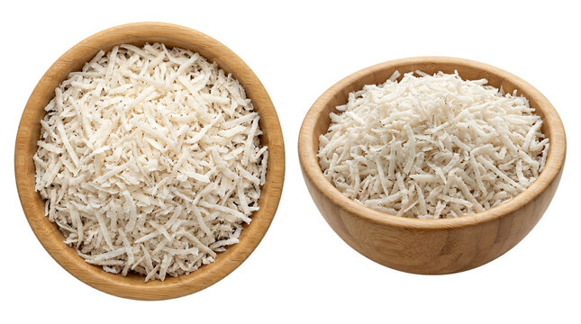 Shredded grated coconut flakes in wooden bowls isolated on transparent background for food packaging design.